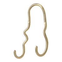 Gold twisted metal hook with a sleek design, ideal for hanging items stylishly. Perfect for modern decor.