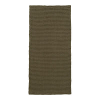 Olive green textured blanket with a checkered pattern, perfect for adding warmth and style to any room.