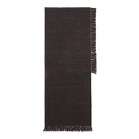 Dark brown textured scarf with fringed edges, featuring a simple, elegant pattern. Perfect for layering in colder seasons.