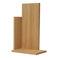 Natural oak wood bookend with a sleek, modern design featuring smooth, light brown tones and minimalistic shapes.