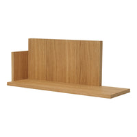 Light oak wood floating shelf with a smooth, natural grain pattern. Perfect for modern home decor.