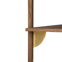 Walnut shelf with smooth wood grain and a circular gold bracket detail, blending warm tones and metallic accents.