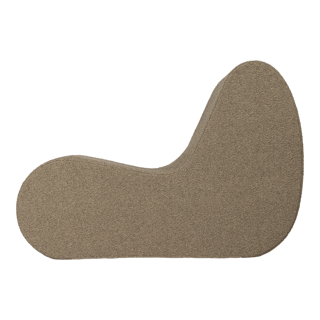 Organic-shaped foam cushion in a muted taupe color with a smooth texture, perfect for modern decor.