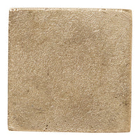 Textured gold square tile with a shiny, metallic finish and subtle surface variations. Ideal for modern decor.