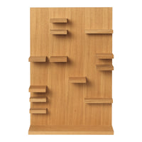 Wooden shelving unit in natural oak finish with an asymmetrical pattern of shelves in varying sizes.