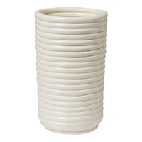 White ceramic vase with a ribbed texture and smooth, glossy finish. Elegant and modern design for home decor.