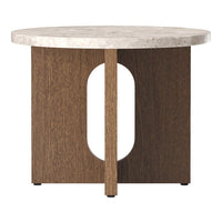 Round marble top side table with dark wood base and modern geometric cutout design. Ideal for contemporary decor.