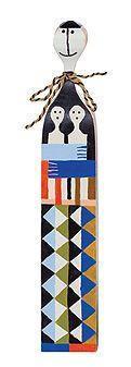 Colorful decorative figure with geometric patterns in blue, black, gold, and green. Unique tribal design accents.