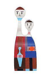 Colorful figurines featuring geometric patterns, blending red, blue, brown, and white hues for a vibrant look.