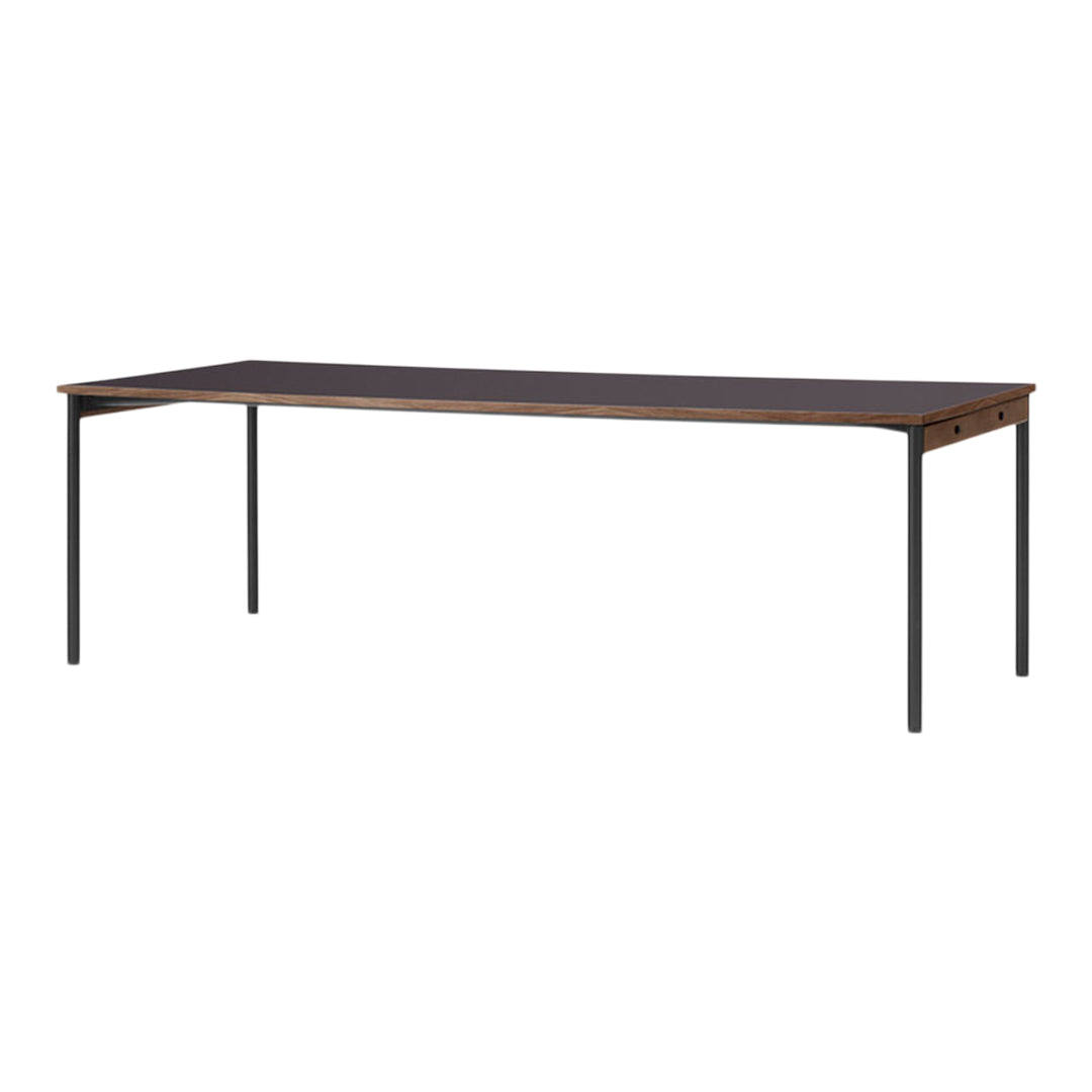 Stylish black table with a wood grain finish and sleek metal legs, perfect for modern office or home decor.