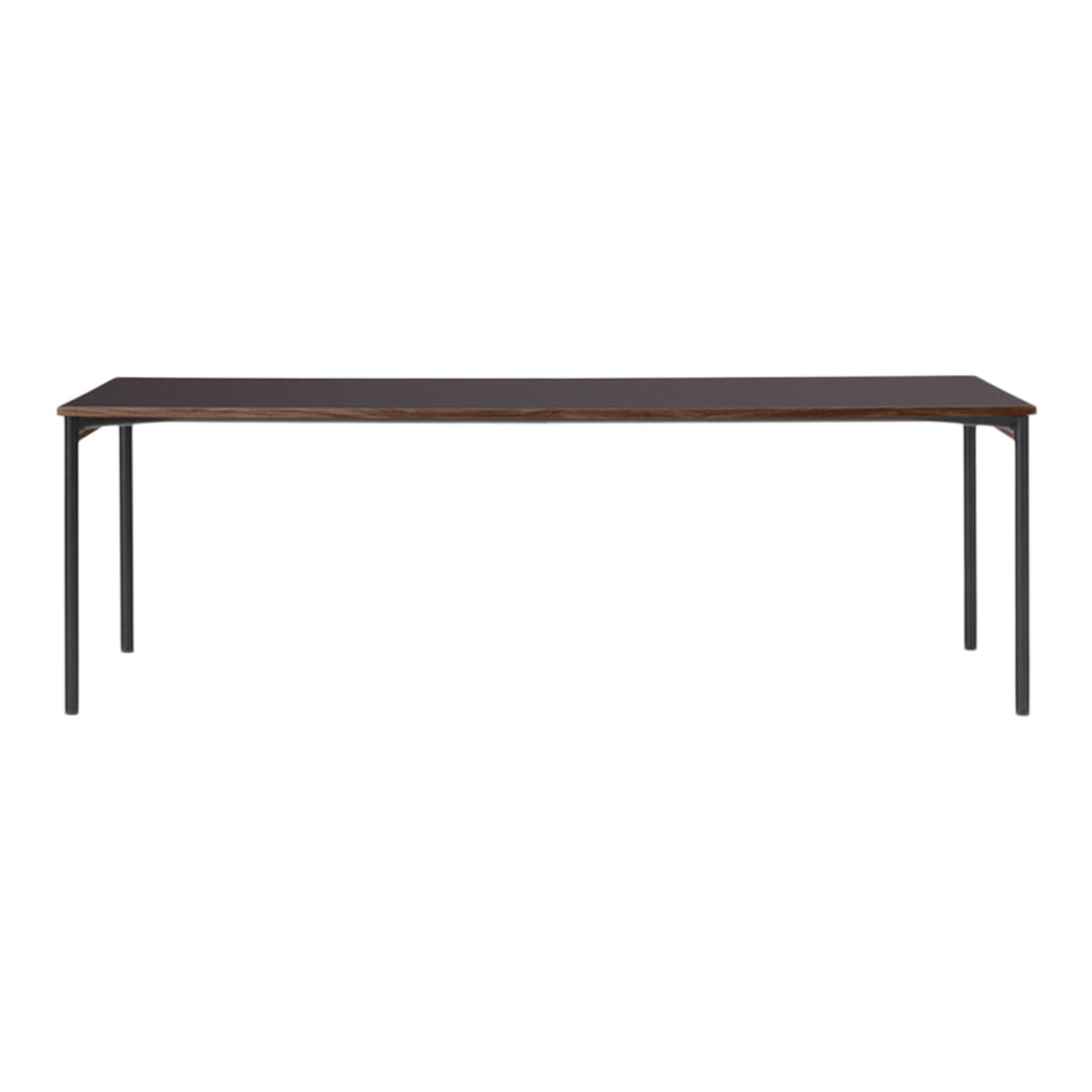 "Dark wood rectangular table with sleek black metal legs, creating a modern and minimalist aesthetic."
