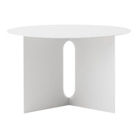 Minimalist round white table with a unique cutout design. Smooth finish and sleek modern aesthetics.