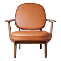 Brown leather armchair with a smooth, rounded design, featuring wooden arms and legs. Modern minimalist style.