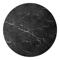 Round black marble surface with striking white veining patterns. Elegant and modern design for upscale decor.