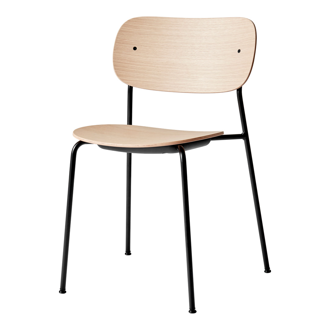 Light wood grain chair with a smooth finish and sleek black metal legs, showcasing a minimalist design.