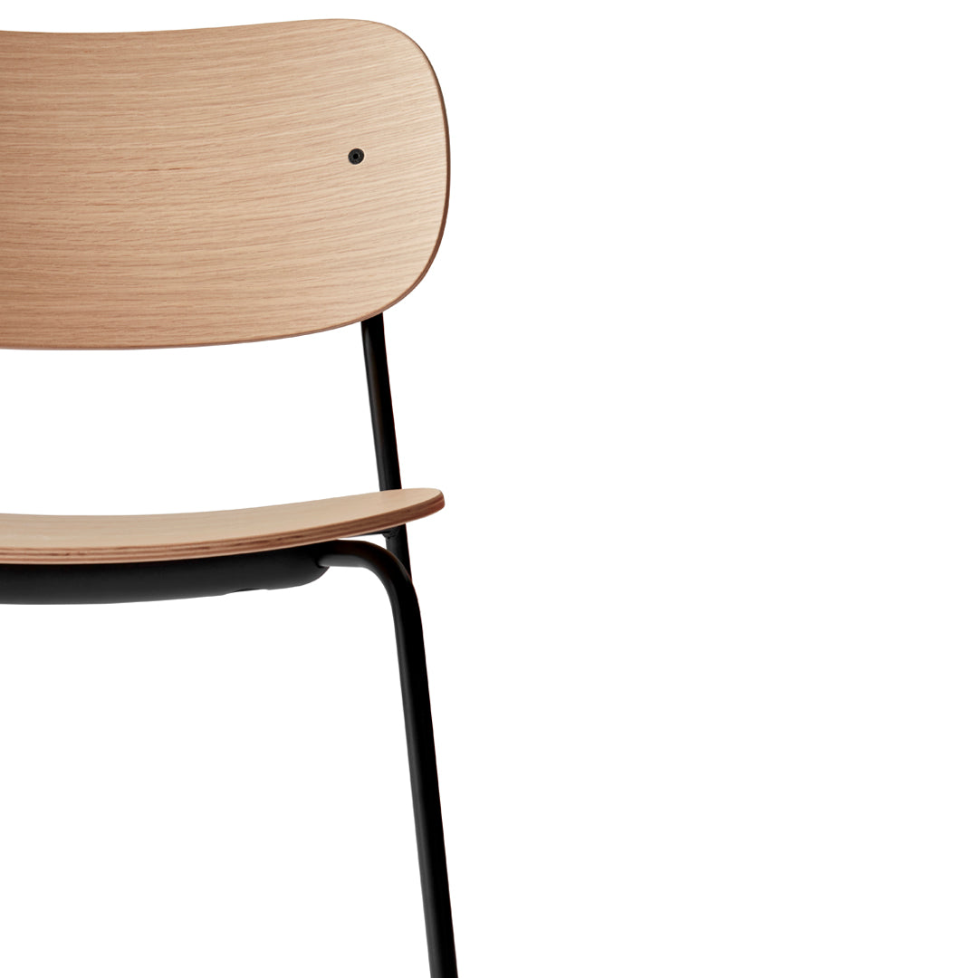 Natural wood finish with subtle grain pattern, complemented by a sleek black metal frame for a modern look.