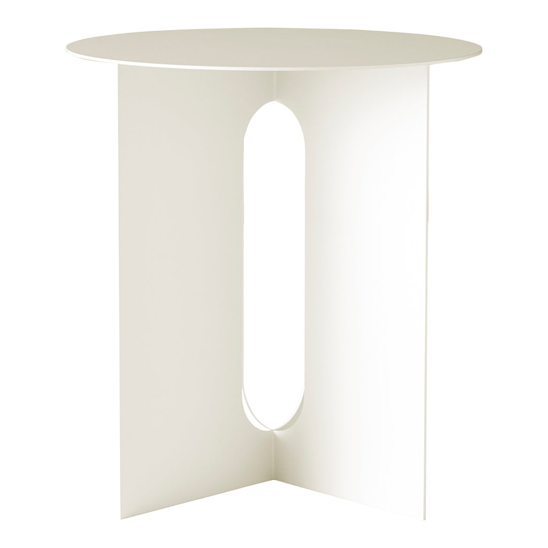 White round table with a minimalist design and an oval cutout, perfect for modern decor.
