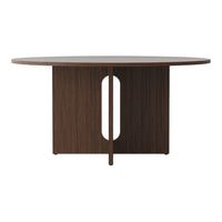 Round wooden table featuring a warm brown finish and minimalist design with a unique cut-out pattern.