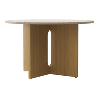 Round table with a natural wood base and a light beige top, featuring a minimalist design. Ideal for modern decor.