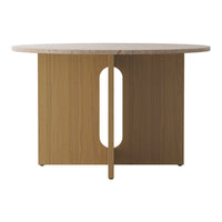 Round wooden table with a light wood grain finish and a subtle beige stone top, featuring a geometric cutout design.