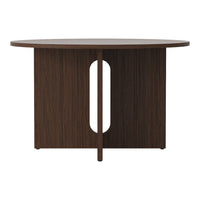 Round wood table in rich brown finish with sleek, vertical grain pattern and modern cut-out design.