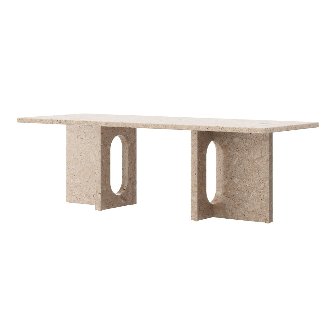 Light beige modern console table with a smooth finish and unique cutout patterns on the legs.