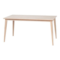 Light wood dining table with a smooth, natural finish and minimalist design, featuring tapered legs for a modern look.