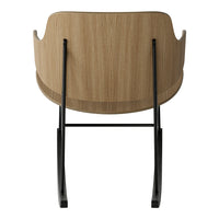 Oak wood back chair with smooth natural wood grain and sleek black metal legs for a modern look.