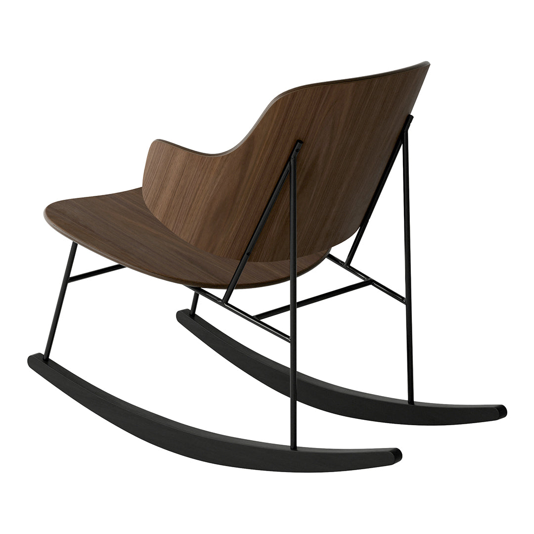 Brown wooden rocking chair with sleek black metal frame and curved design for modern decor.