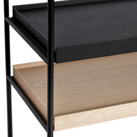 Black and wooden shelves with a sleek matte finish and minimalist design, showcasing contrasting colors and textures.