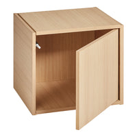 Natural wood finish cube with a smooth surface and an open door design, showcasing a minimalist, modern style.