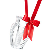 Clear crystal vase with textured patterns and vibrant red satin bow, perfect for elegant décor.