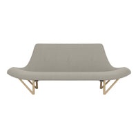 Light grey modern sofa with a sleek design and wooden legs, showcasing a minimalist pattern.