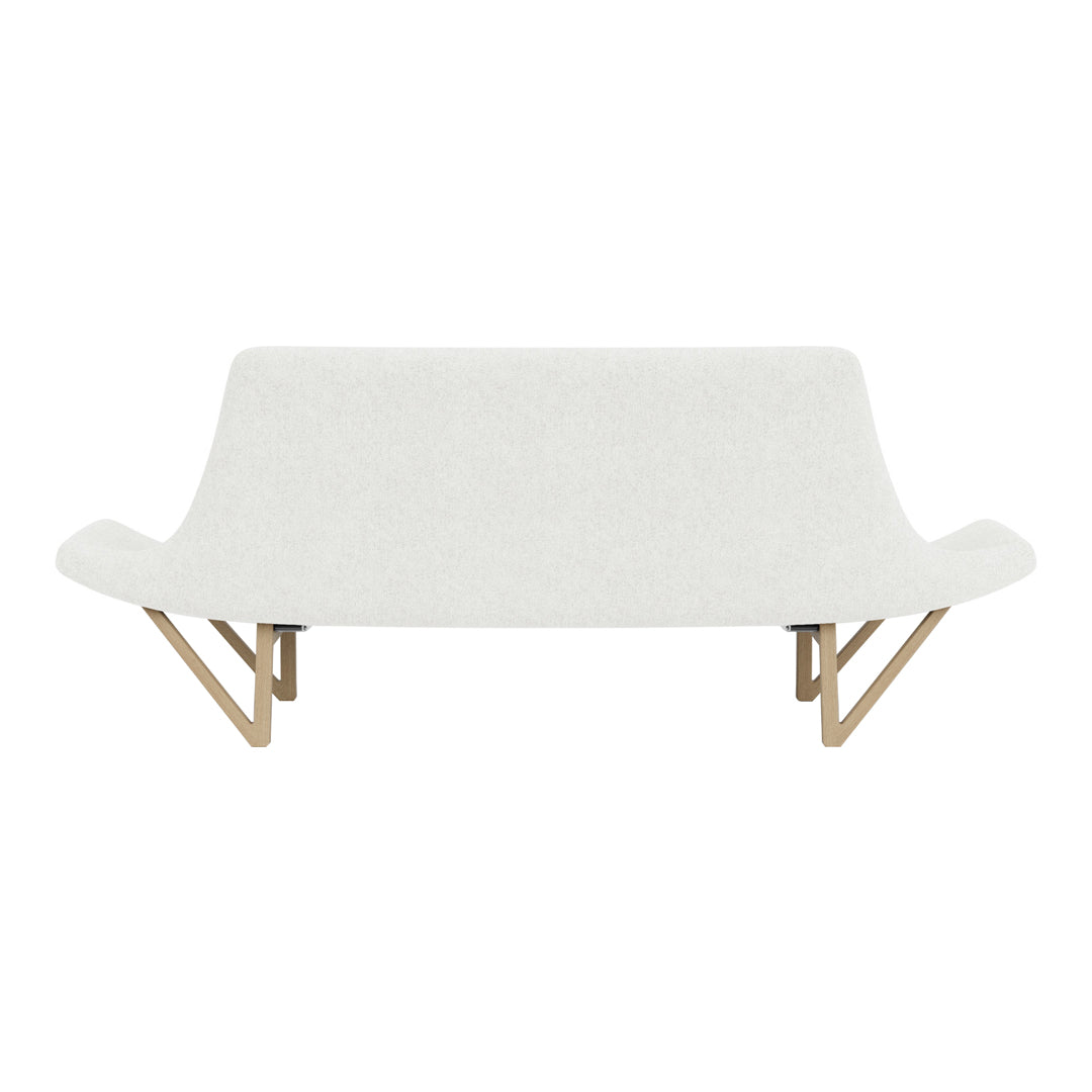 White modern sofa with minimalist design and natural wood legs. Soft texture enhances contemporary style.