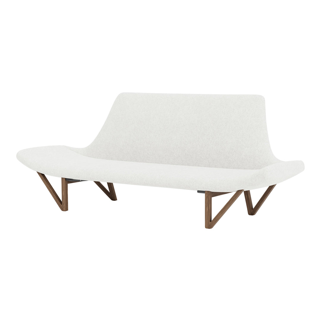 Modern white sofa with smooth upholstery and wooden tripod legs. Minimalist design with a clean, sleek aesthetic.