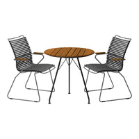 Black and wooden outdoor dining set featuring striped design on chairs and a smooth circular table.
