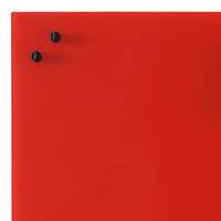 Bright red surface with matte finish, featuring two black knobs, creating a modern and bold visual contrast.