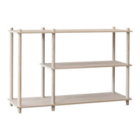 Light wood shelving unit with a minimalist design featuring three open shelves and natural wood grain pattern.
