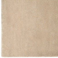 Beige textured surface with a smooth, subtle sheen for a minimalist, modern aesthetic. 