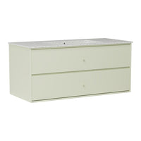 Light green dresser with a textured white top and two spacious drawers, perfect for stylish storage solutions.