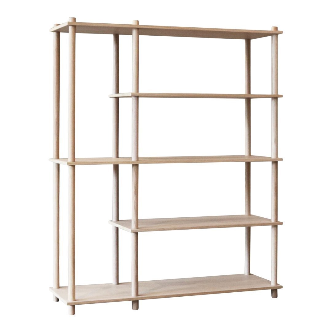 "Natural-toned shelf with dark brown walls, featuring green decor and earthy brown books."