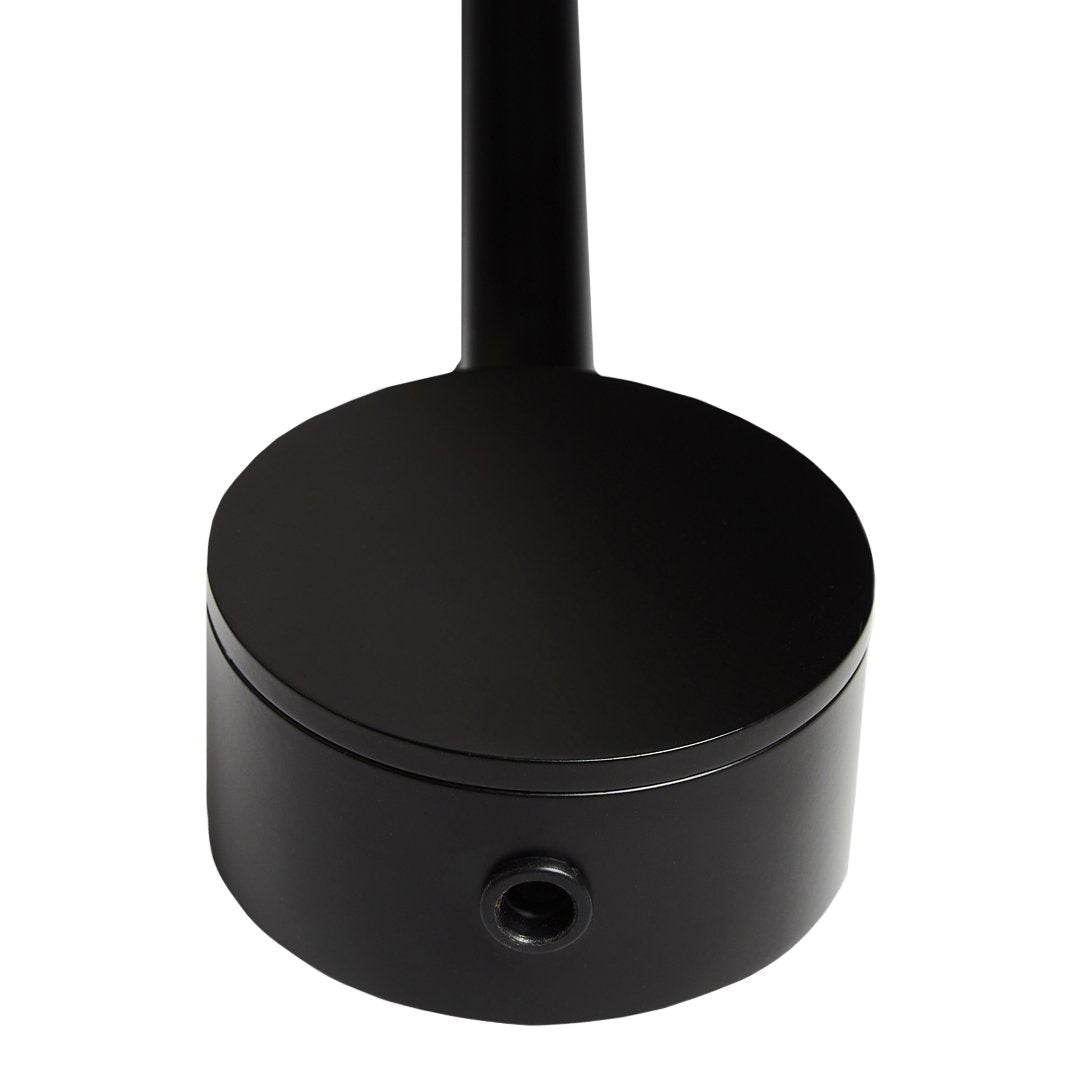 Black lamp base with a smooth round design and sleek, minimalist pattern. Ideal for modern decor.
