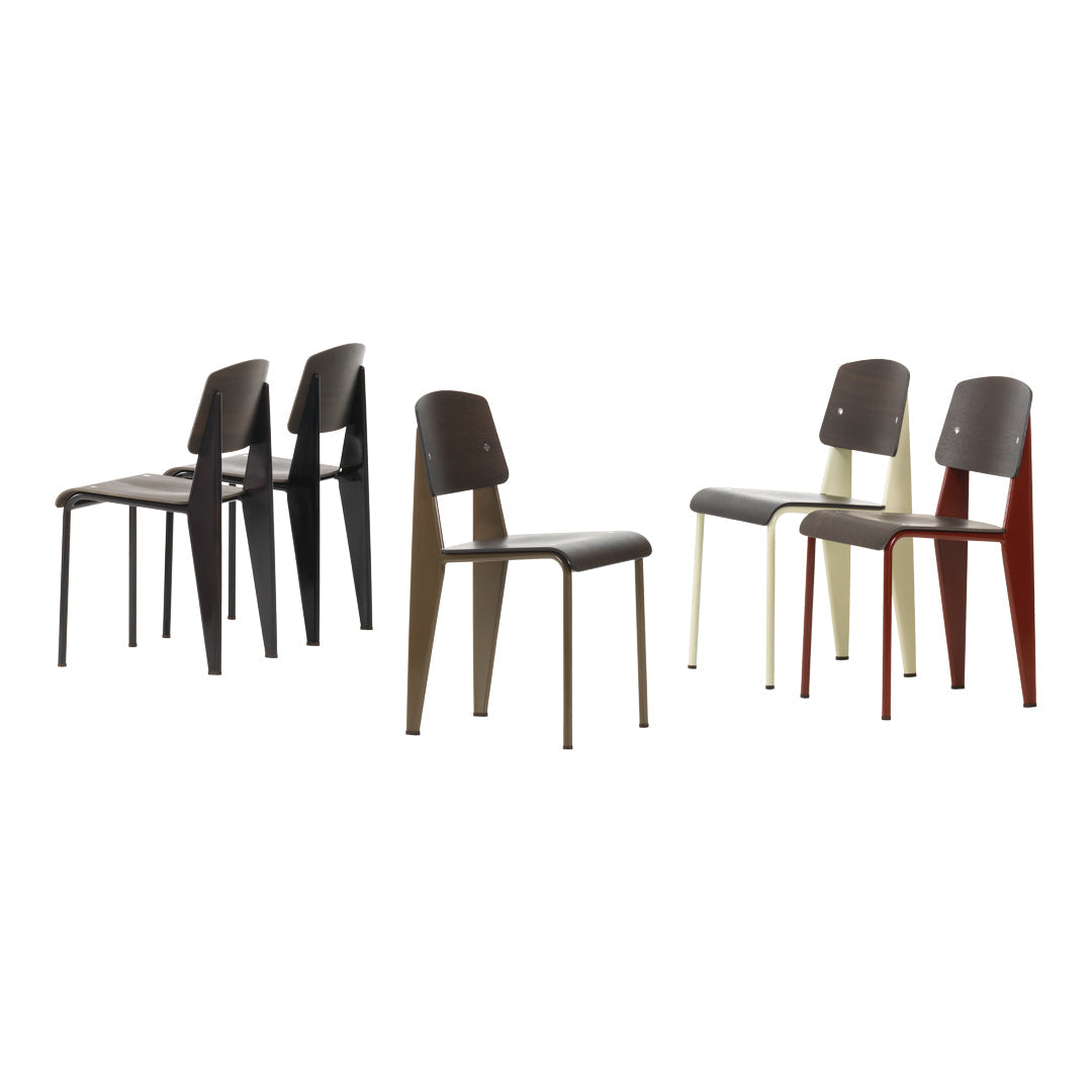 Set of modern chairs in black, brown, cream, and red with sleek, minimalist design and smooth finishes.