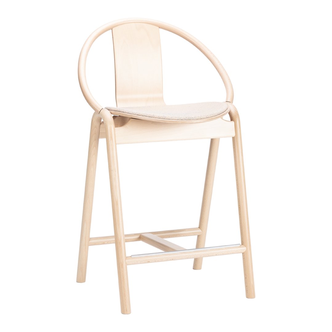 Light natural wood bar chair with a smooth, minimalist design and oval backrest, showcasing a neutral color palette.