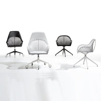 Four ergonomic chairs in black and white with a modern mesh pattern on a clean, white background.