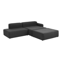 Modern black sectional sofa with sleek lines and a stylish, minimalist design. Perfect for contemporary living spaces.