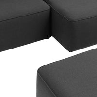 Stylish black sofa sectional with a smooth texture and modern design. Perfect for contemporary living spaces.