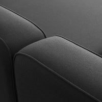 Textured black fabric sofa cushions with sleek, modern design and subtle seams for contemporary elegance.