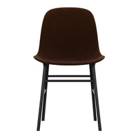 Brown velvet chair with a smooth finish and black metal legs for a modern, minimalist look.