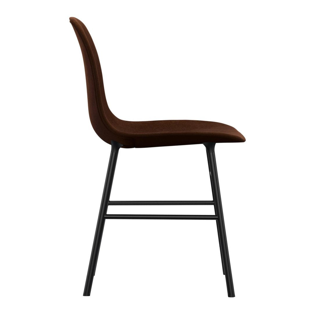 Brown velvet chair with a sleek black metal frame, showcasing a modern and minimalist design. Perfect for any decor.